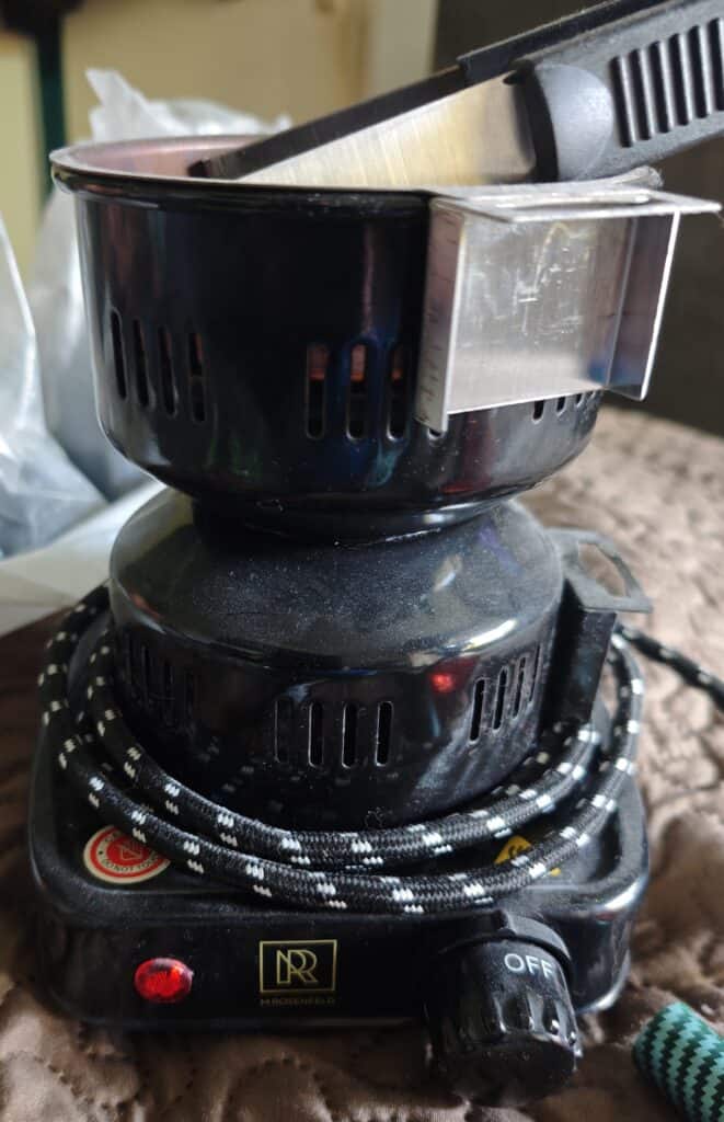 Elektrischer Heizstab für Shisha mit Glasbowl und Kabel.