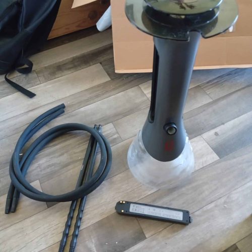 Luftbefeuchter mit Glasbehälter und Zubehör, ideal für Raumluftverbesserung.