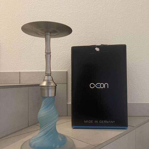Kerzenständer mit blauer Basis und schwarzer Verpackung, ideal für Shisha-Accessoires oder Dekoratio.